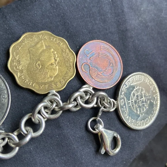 925 sterling silver coin charm bracelet 11 of them on here milor bracelet